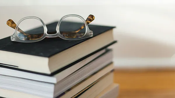couple kissing under gray clouds