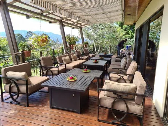 a bowl of fruit sitting on a kitchen counter