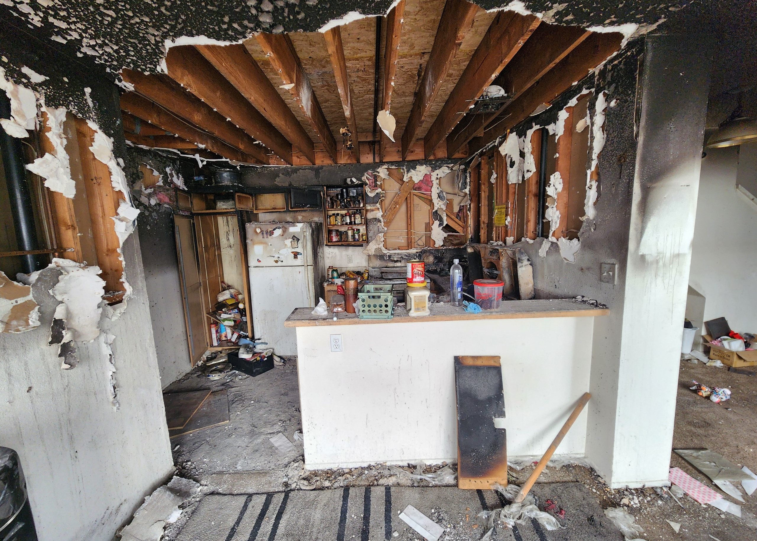 fire damaged house for sale