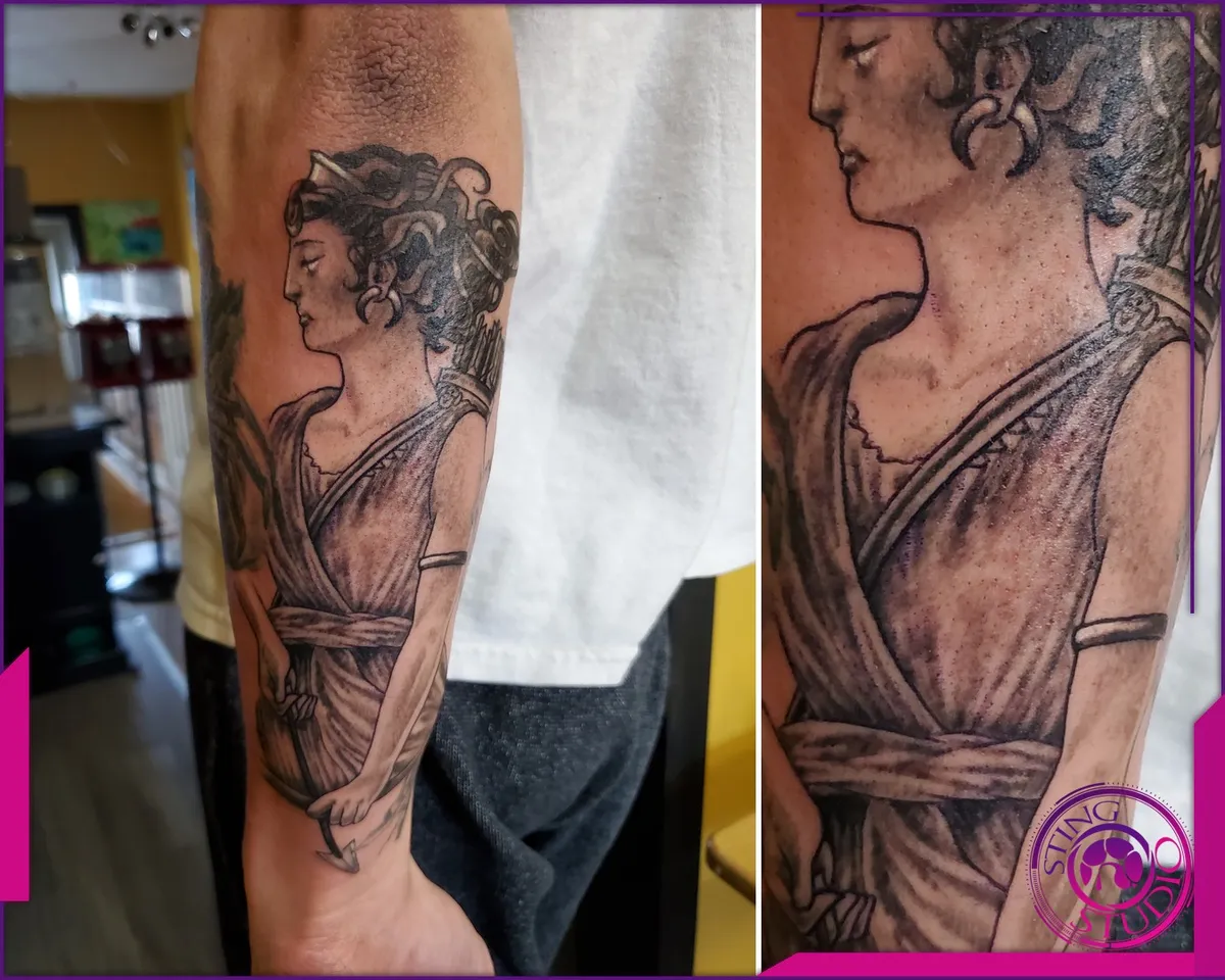 Black and grey tattoo by Sting Studio Ottawa