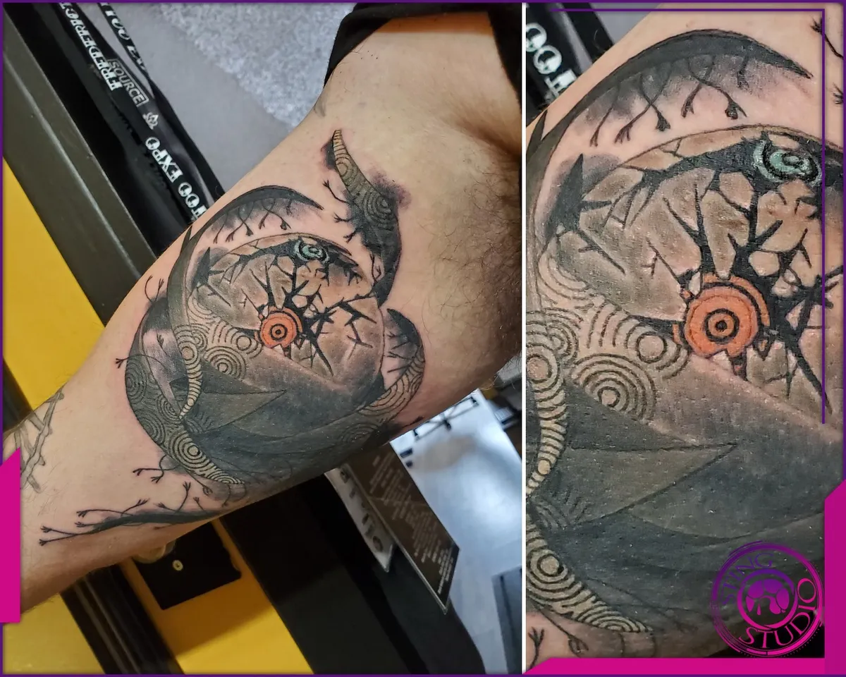 Black and grey tattoo by Sting Studio Ottawa