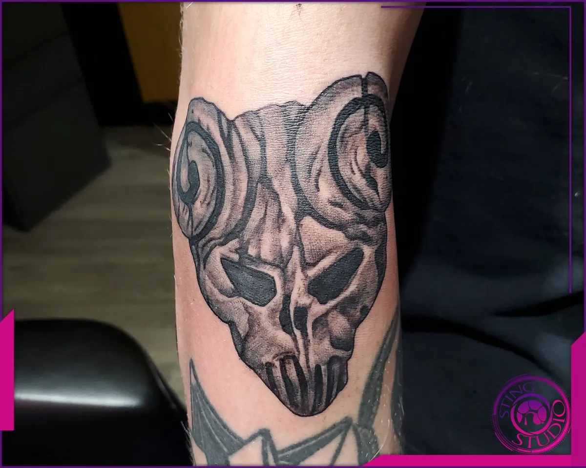 Black and grey tattoo by Sting Studio Ottawa
