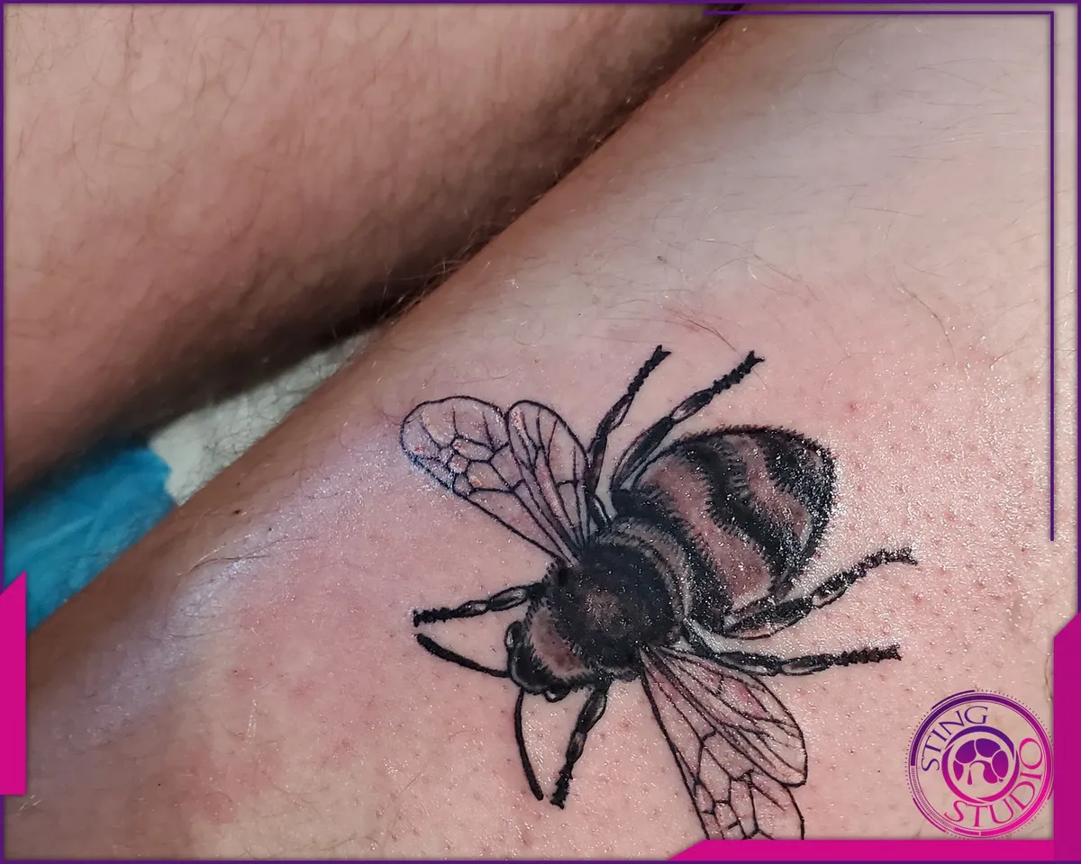 Black and grey tattoo by Sting Studio Ottawa