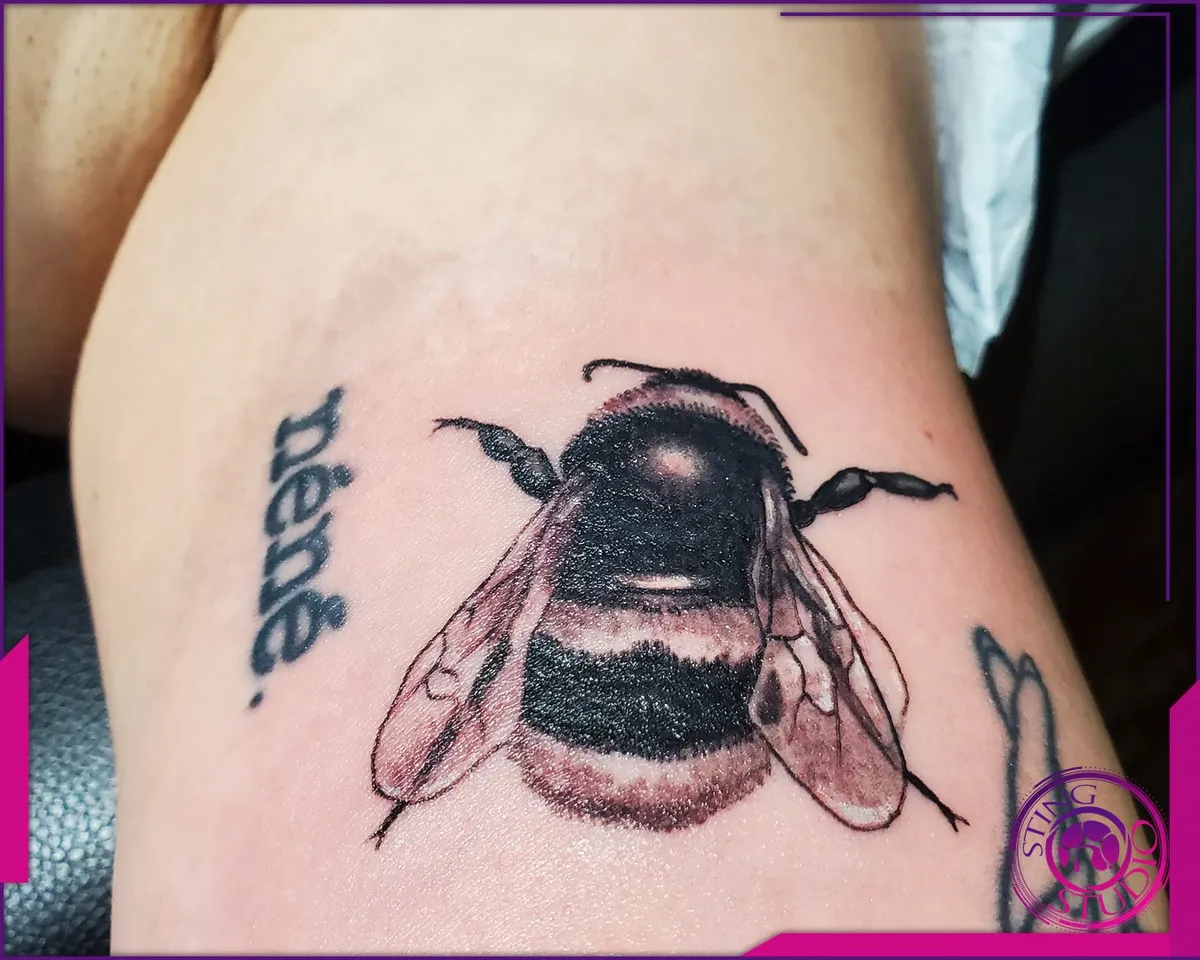 Black and grey tattoo by Sting Studio Ottawa