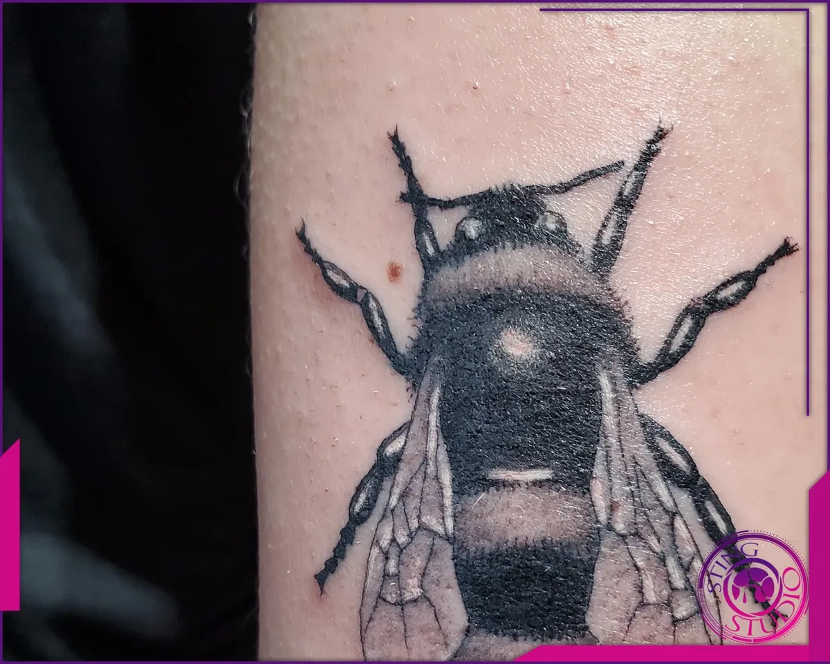 Black and grey tattoo by Sting Studio Ottawa