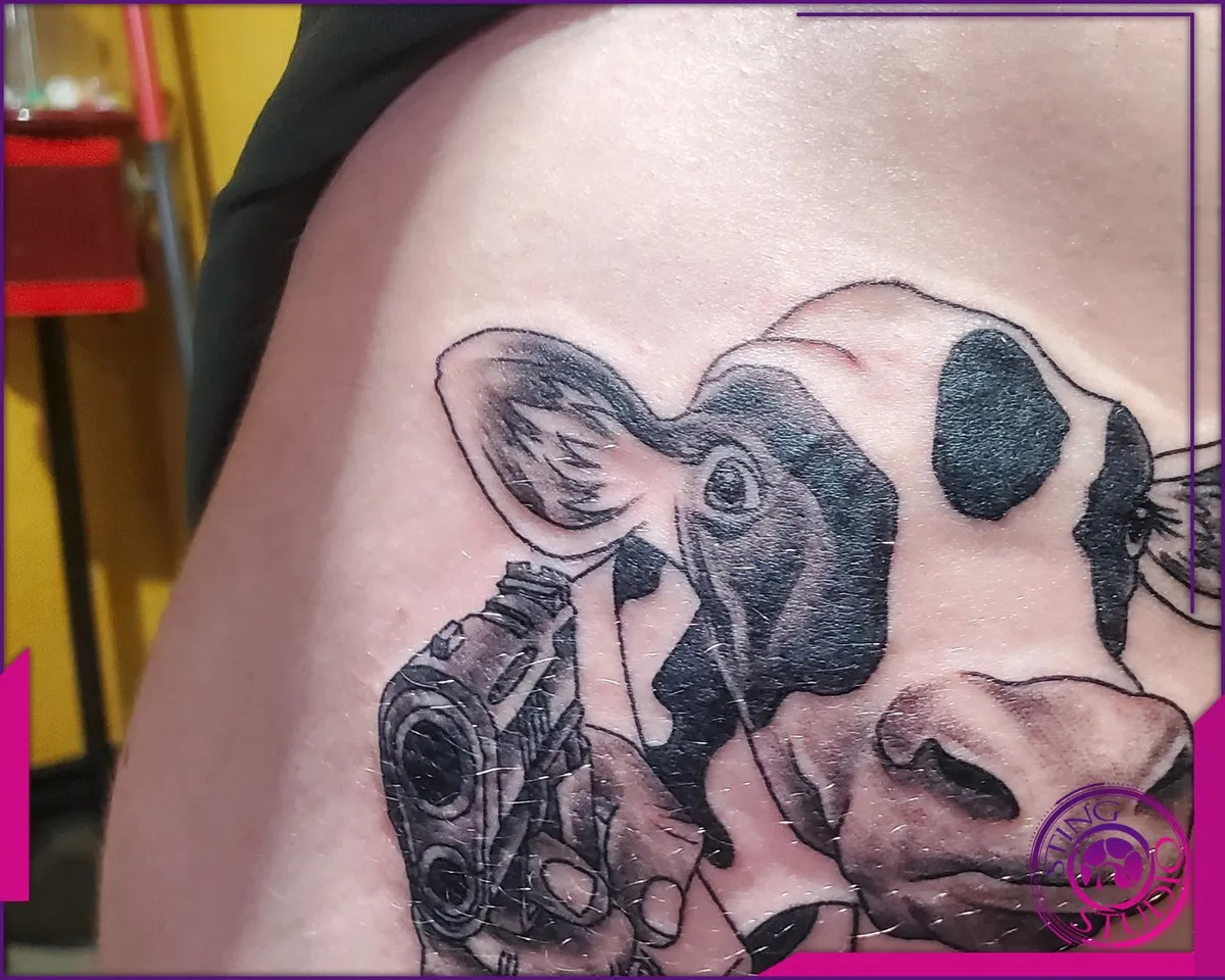 Black and grey tattoo by Sting Studio Ottawa