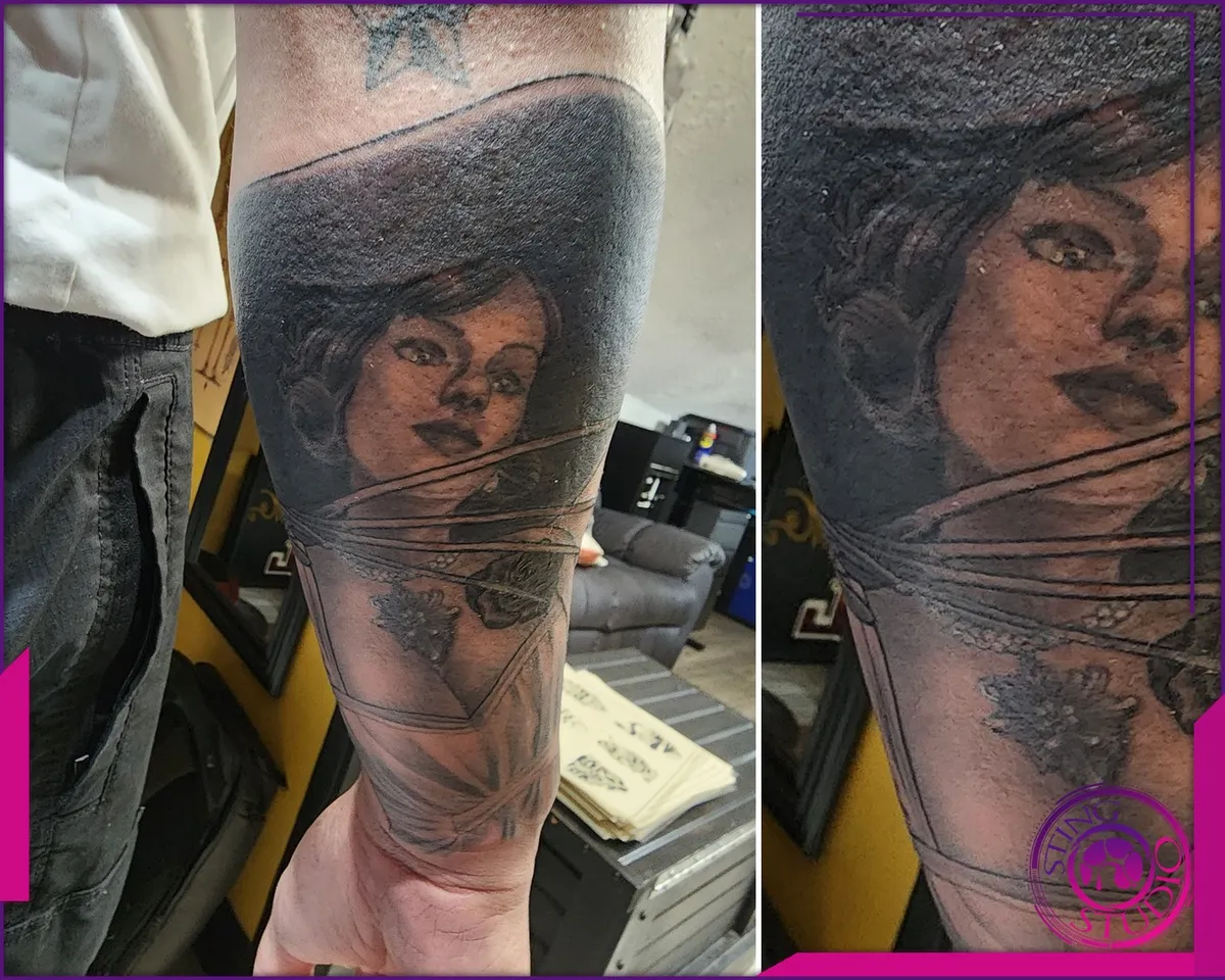 Black and grey tattoo by Sting Studio Ottawa