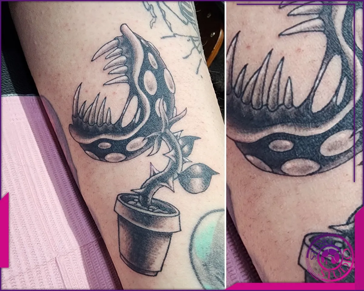 Black and grey tattoo by Sting Studio Ottawa