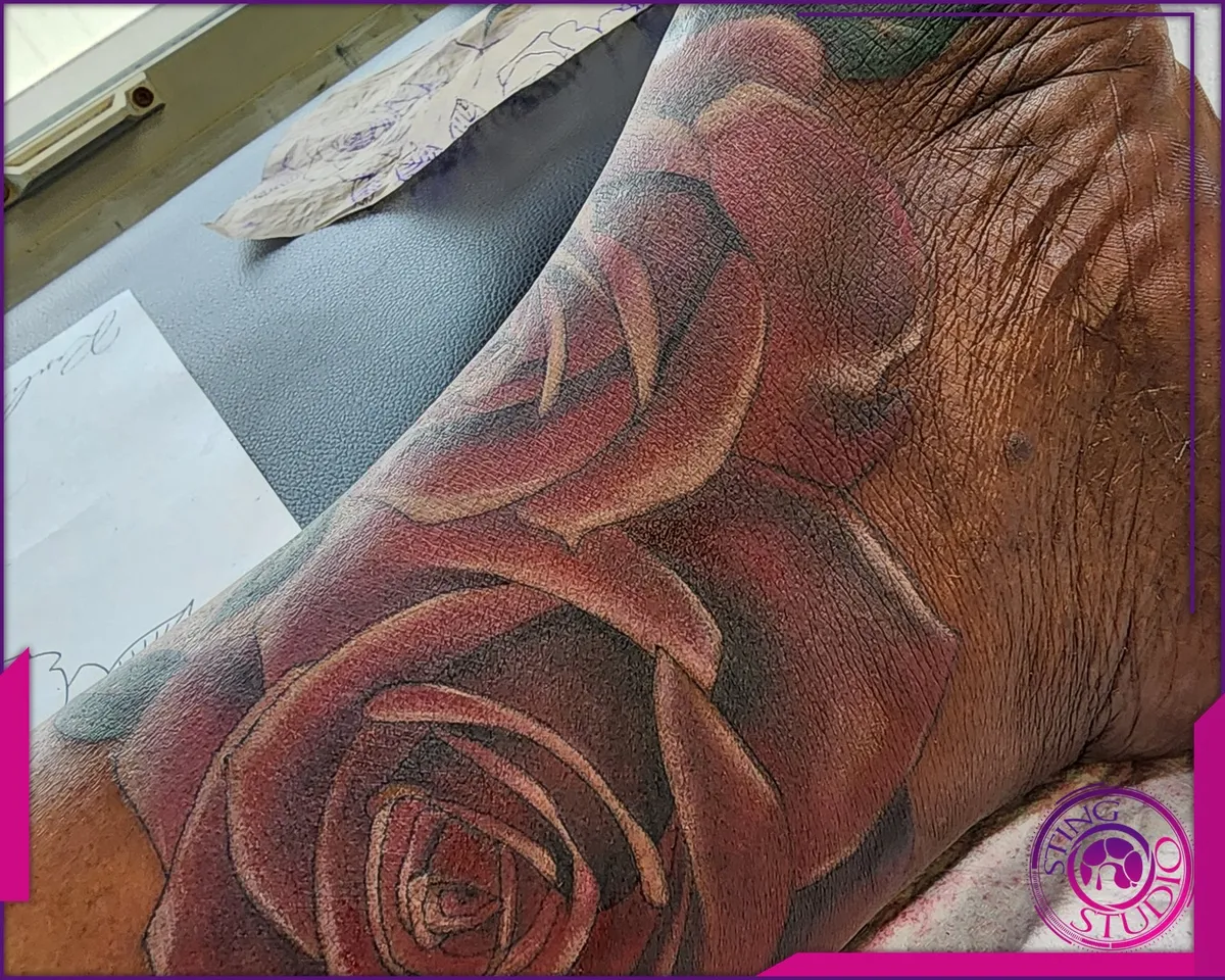 Black and grey tattoo by Sting Studio Ottawa