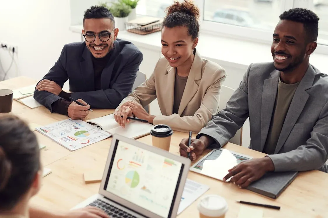 Business meeting, Smiles at a meeting, 2 guys 1 girl business setting