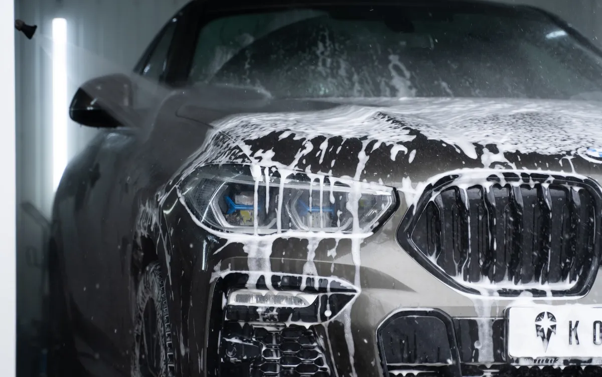 a gray car being washed
