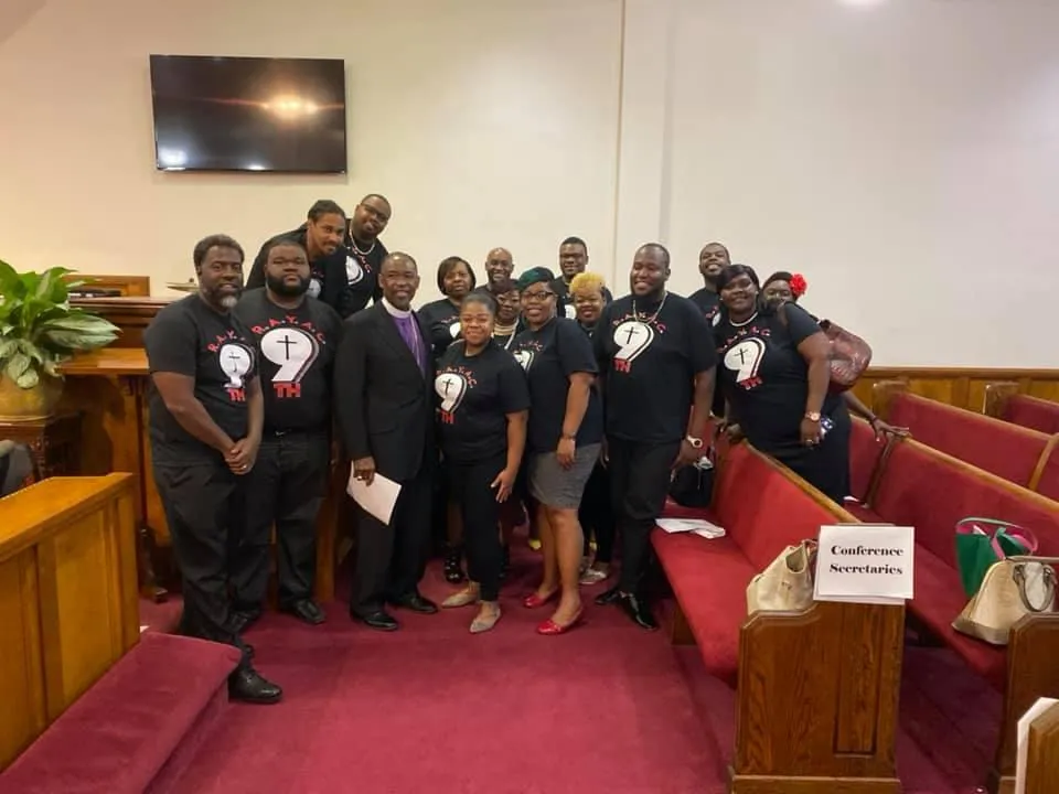 people sitting in front of table talking and eating