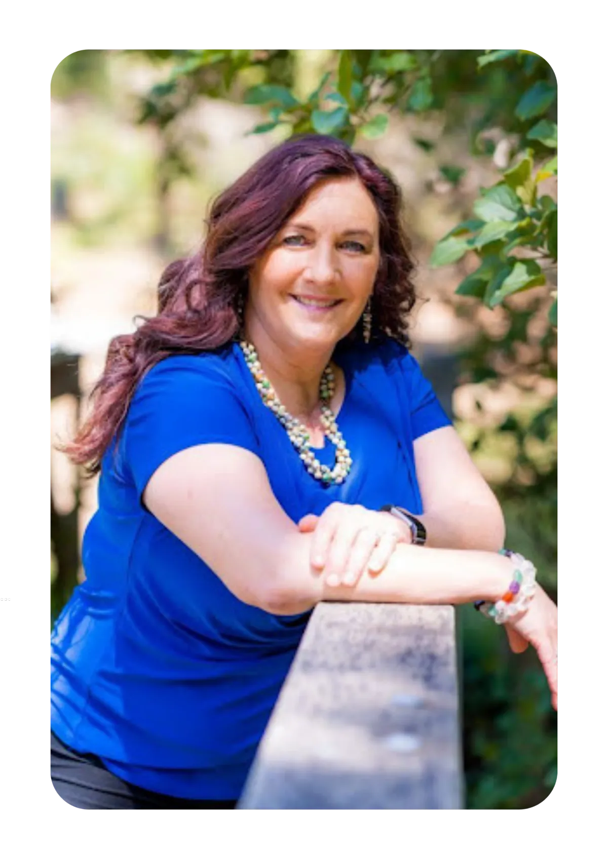 Cheri smiling outdoors