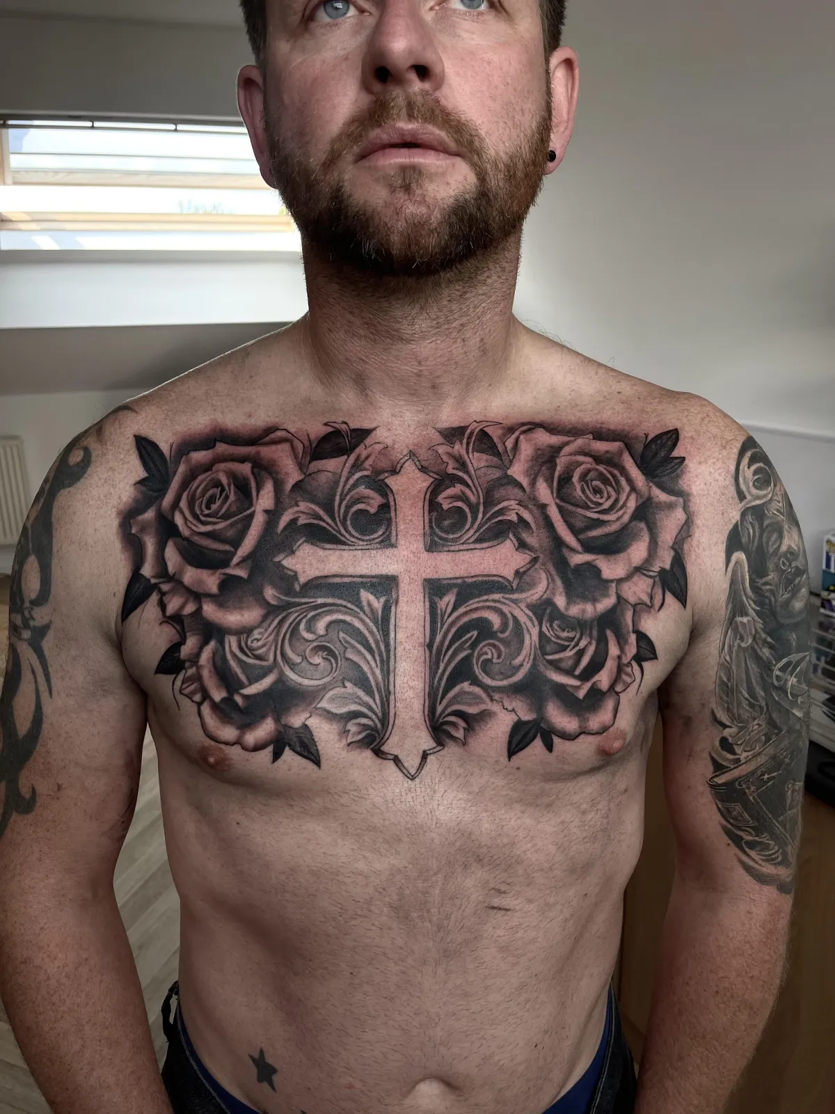 person with tattoo on right arm