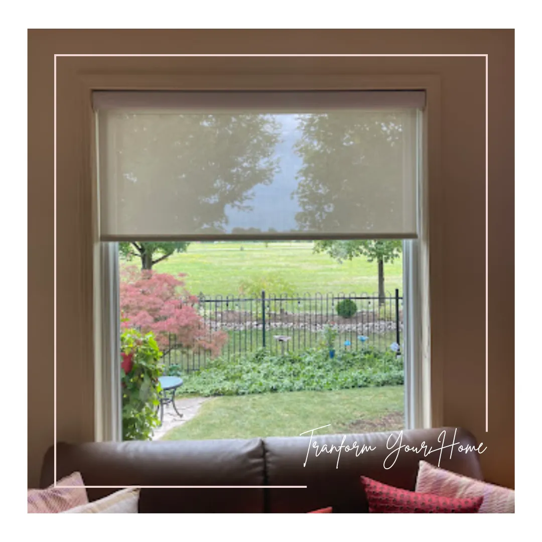 A beige Maxxmar window shade installed in a picture window over a couch in Oakville by Fasada.