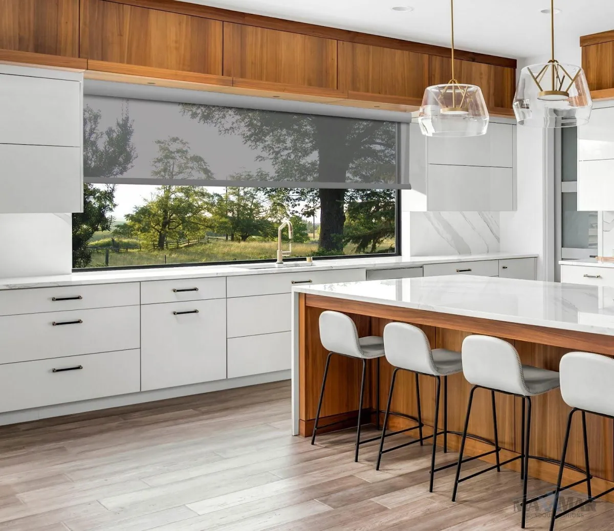 Roller blinds expertly fitted over a kitchen window that allows light to enter while still retaining privacy.