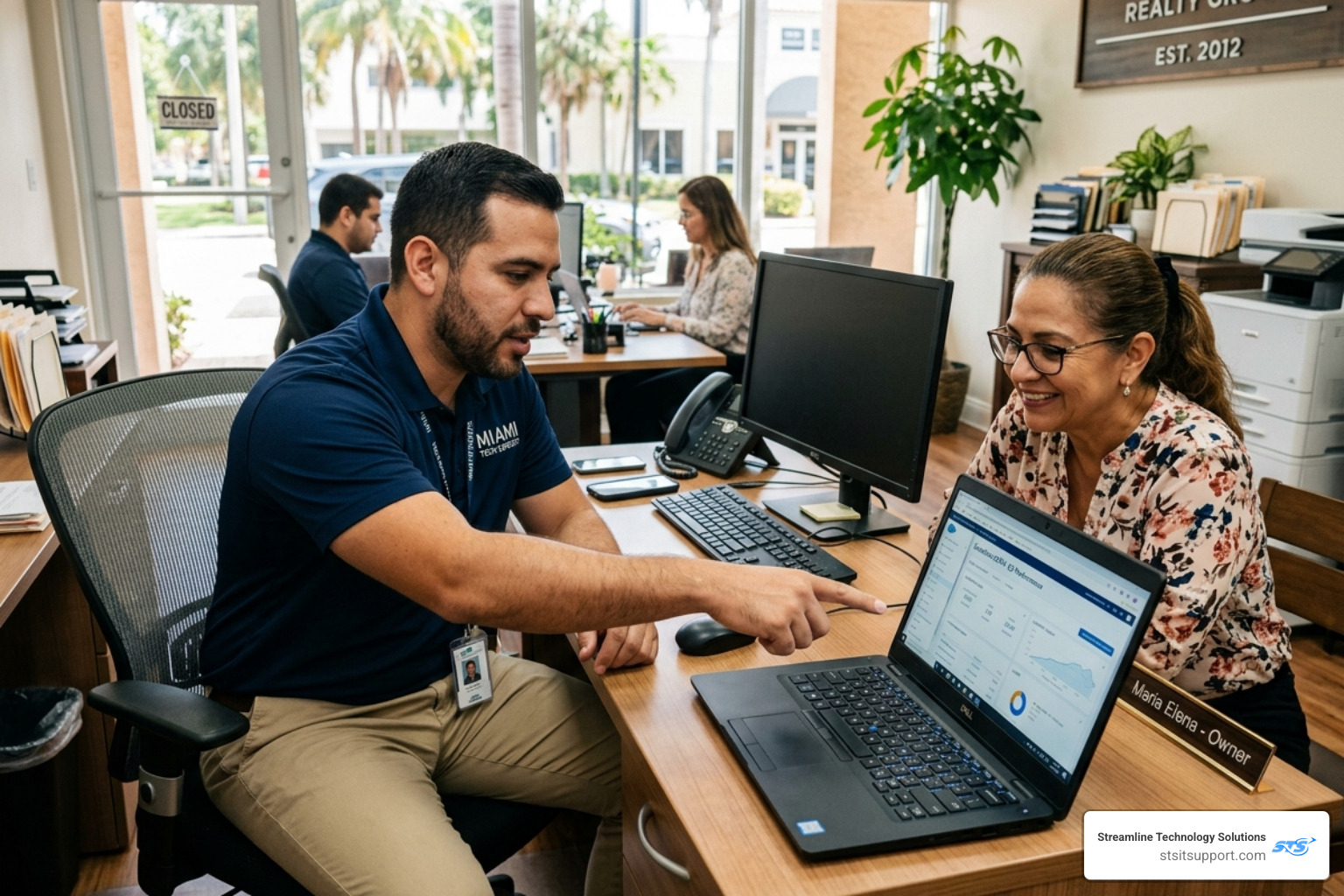 local it support technician helping small business owner on-site - local it support