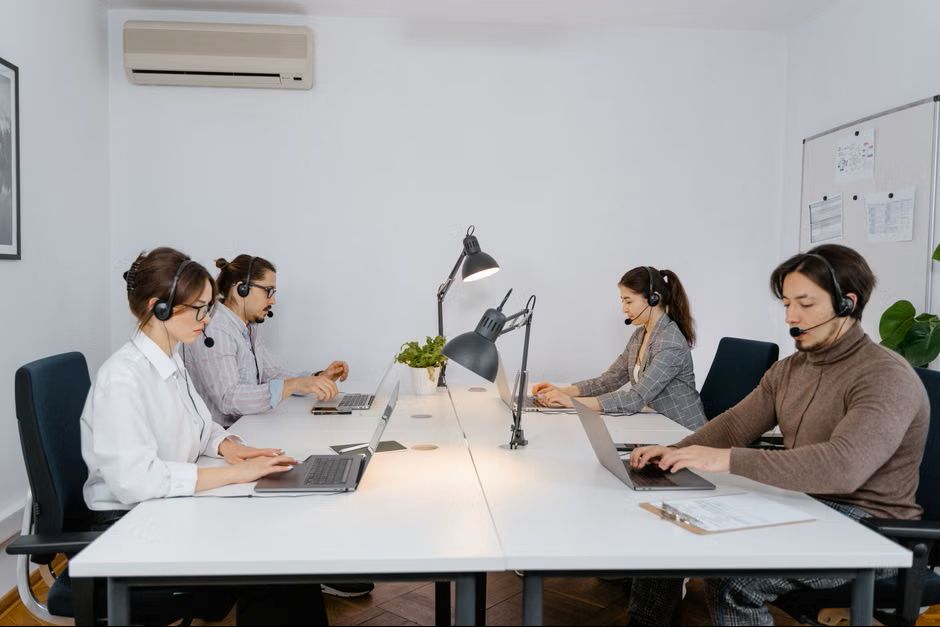 IT helpdesk outsourcing team working remotely