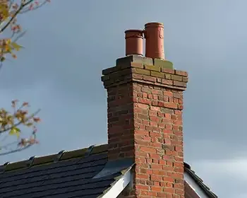 A tall blue shelf with a ladder on top of it