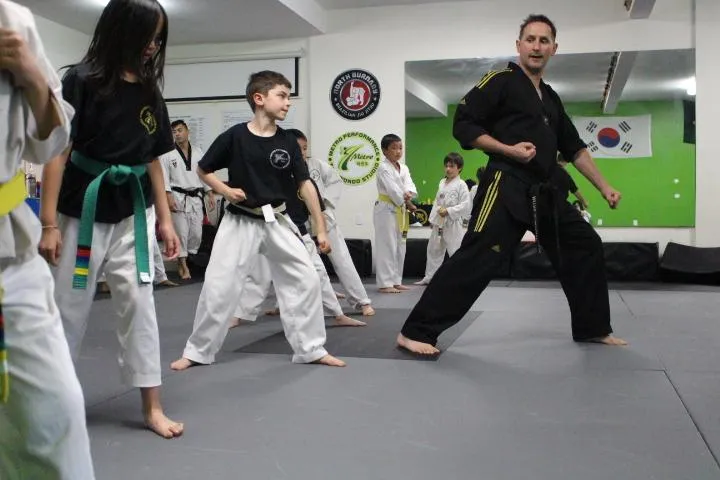 Young children practicing Taekwondo at Metro Performance Taekwondo Studio in Burnaby