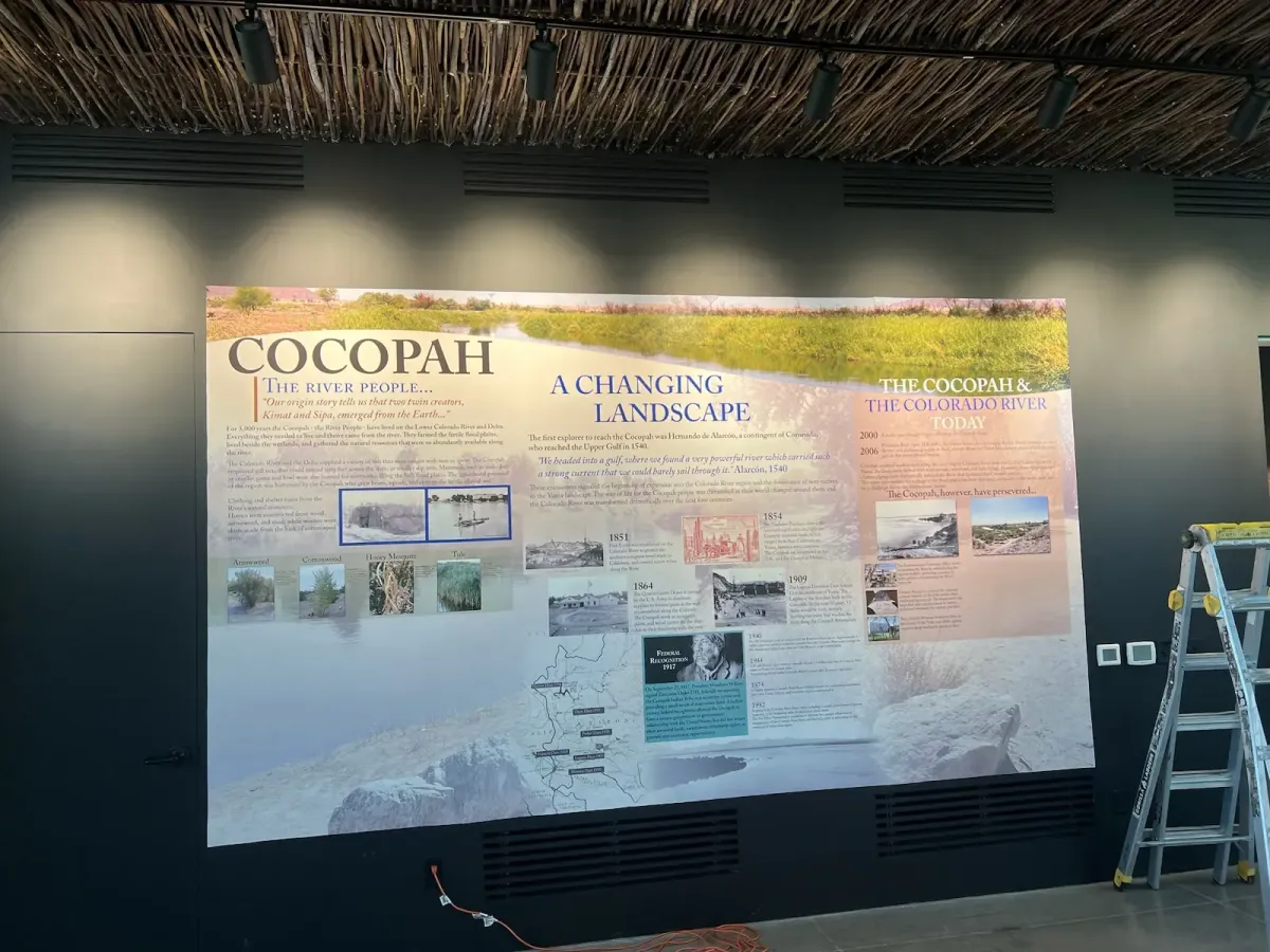 A wall mural with information about the Cocopah people