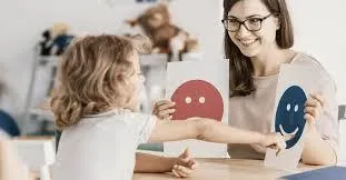 Girl follows directions during arts and crafts time.