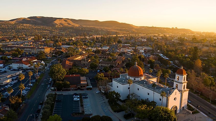 Southern California city skyline with mountains in background