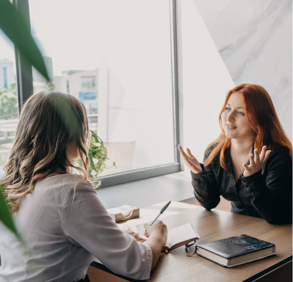 Two women talking