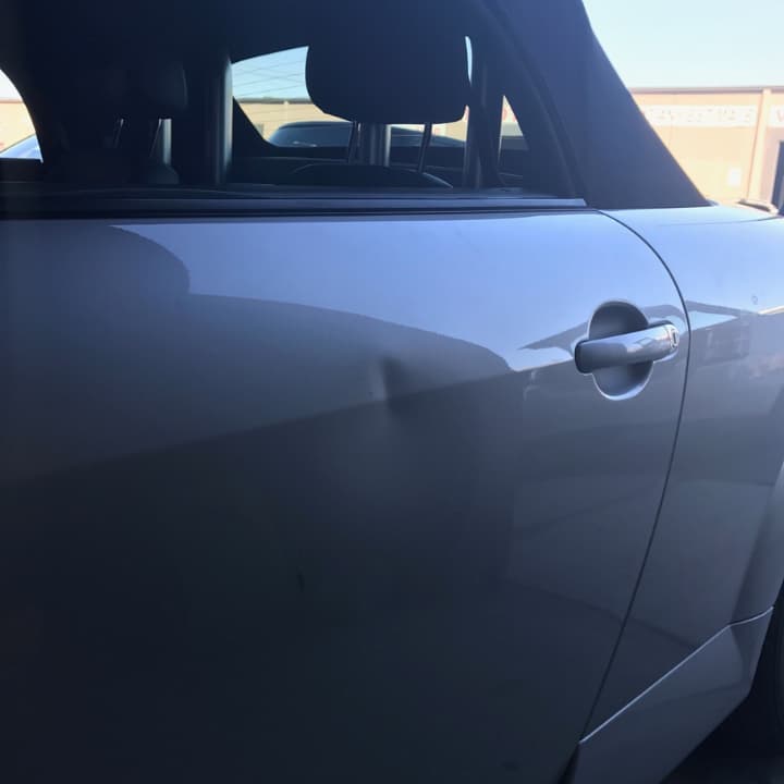 palm-coast-paintless-dent-repair-door-ding-before