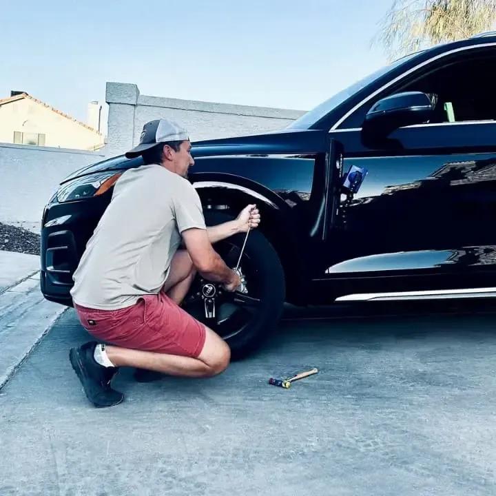 paintless dent repair on car hood in Palm Coast