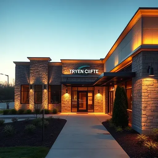 Recently installed modern LED outdoor lighting on a Lawrenceburg KY building with landscaped surroundings and evening sky