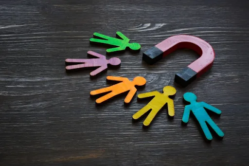 magnet with colorful persons