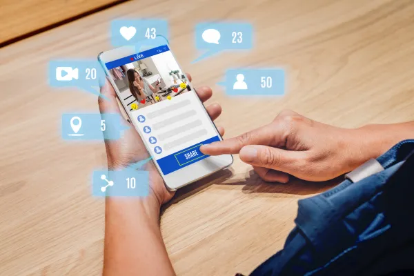 woman share view of beauty blogger review online with mobile apps on wood table at home,online influencer technology in daily lifestyle,Digital age concept.