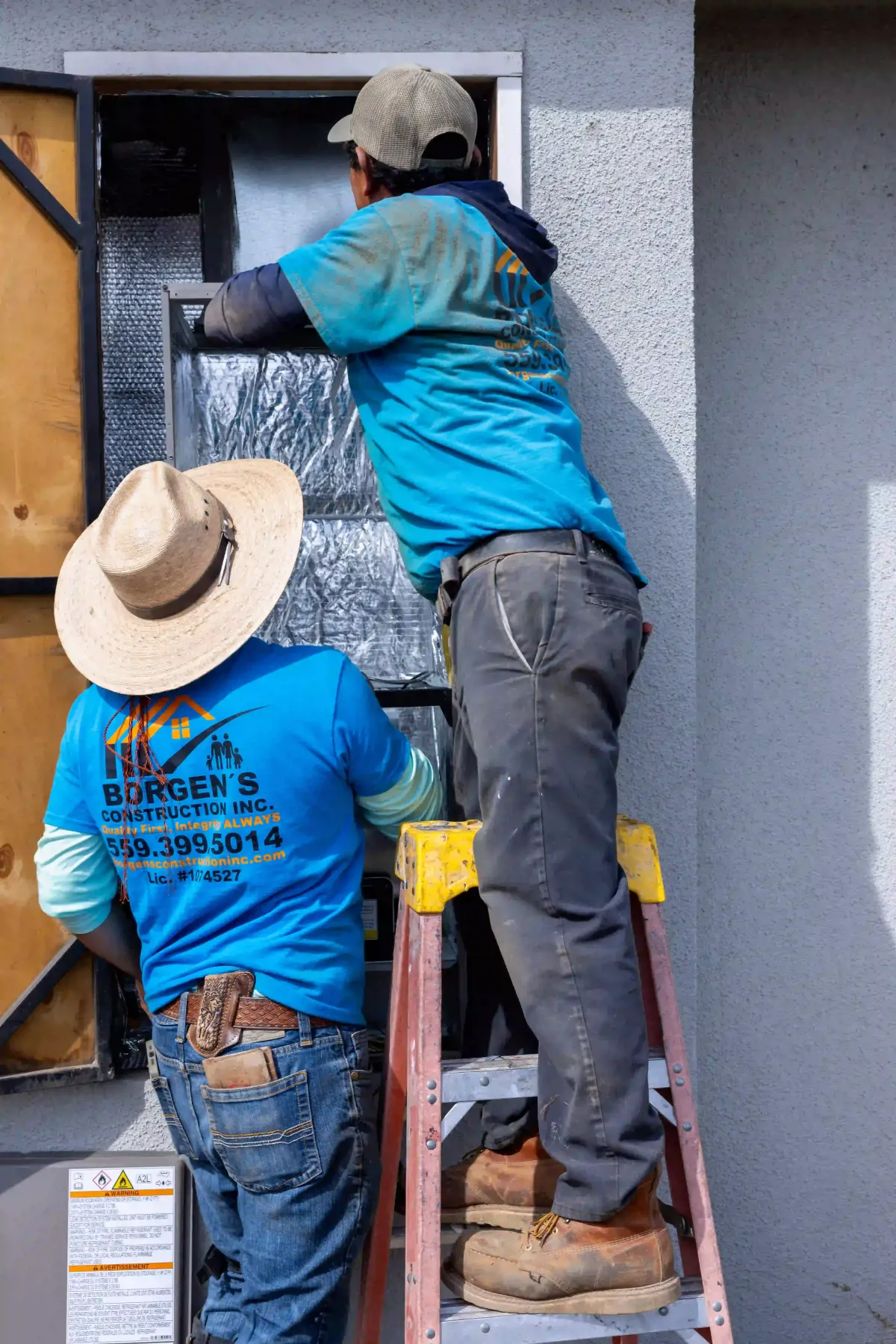 Borgen’s Construction HVAC technicians installing and servicing residential ductwork and ventilation systems at a home in Fresno, CA