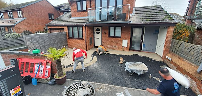 The Elite Resin Surfacing team in Bournemouth working on a Driveway Installation