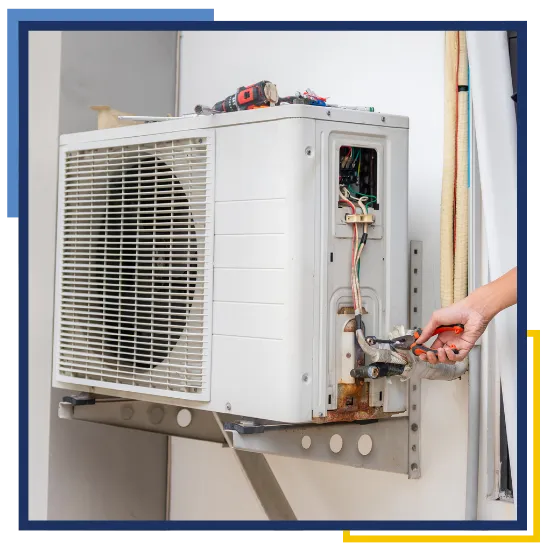 Technician providing HVAC repair in the Woodlands, TX at a residential property