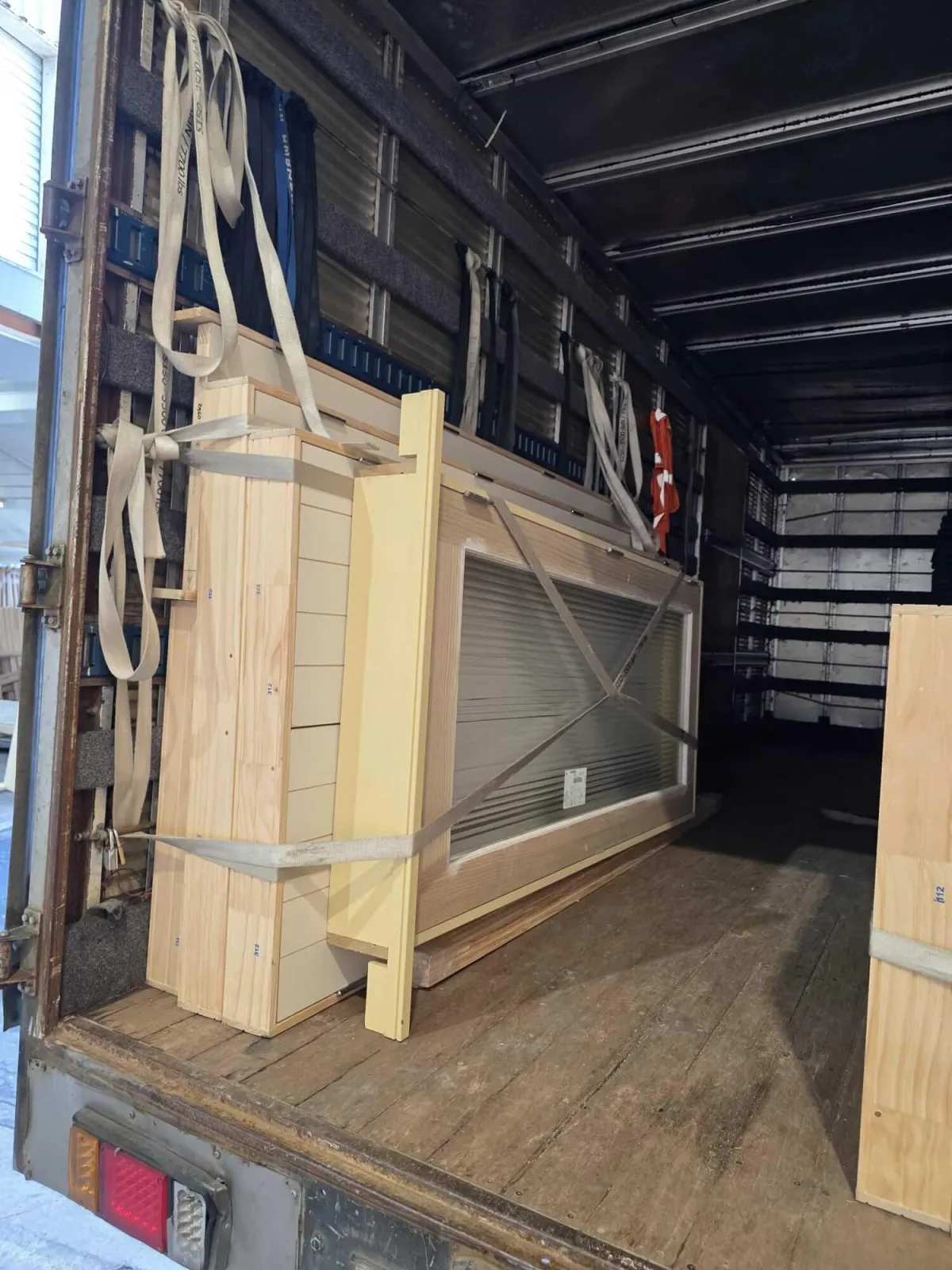 Furniture securely loaded inside Auckland moving truck