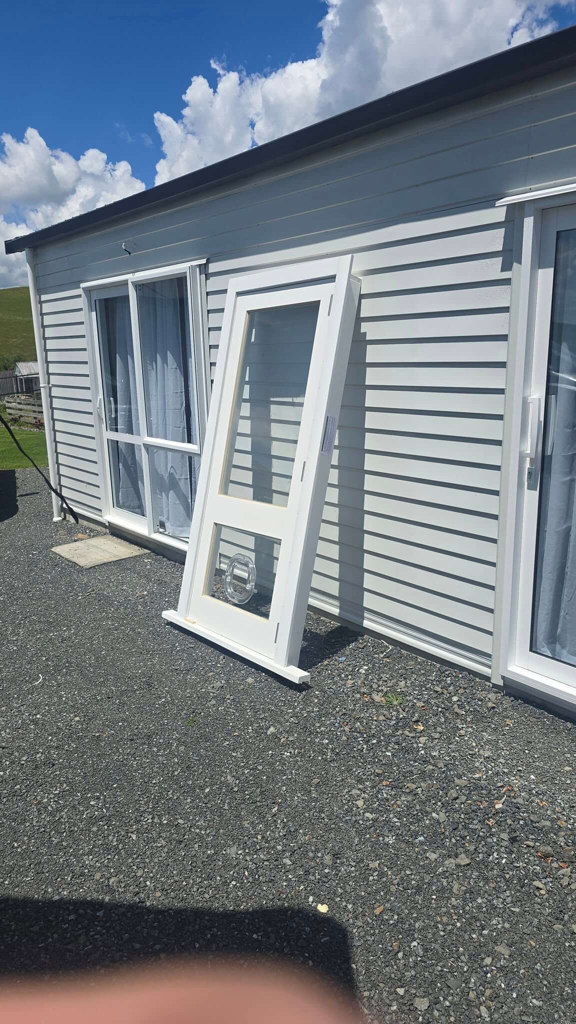 Full house movers in Auckland unloading furniture at new home