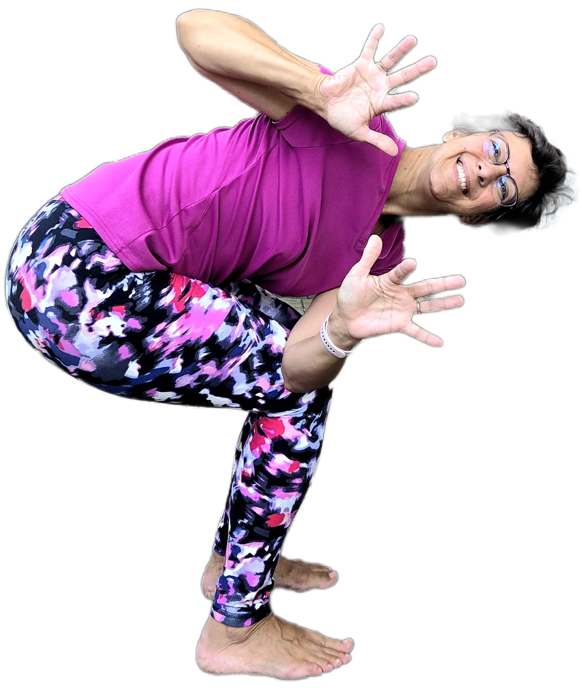 a statue of a buddha in front of a wooden wall