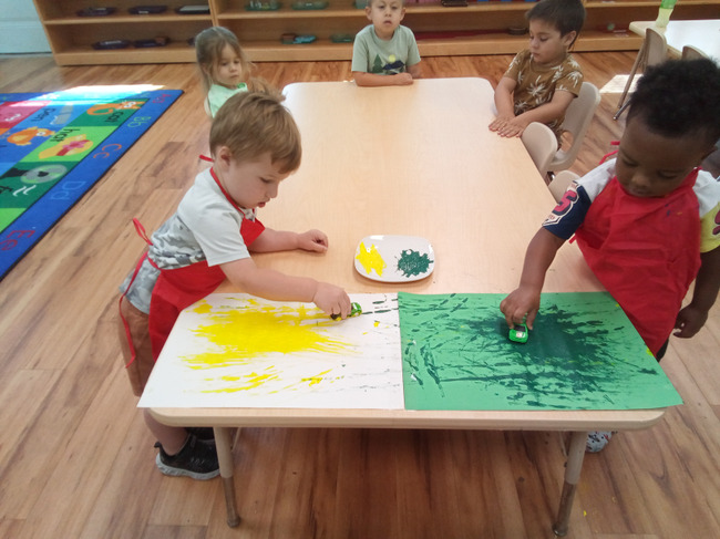 Montessori preschool children participating in a hands-on learning activity