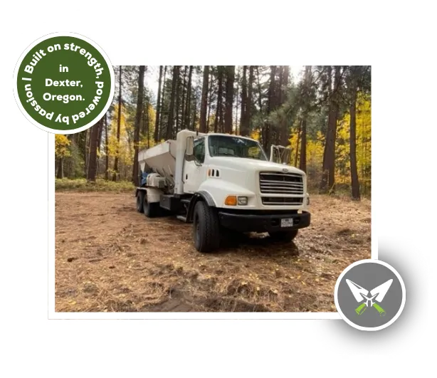 Volumetric concrete delivery truck in forest, built on strength in Dexter, Oregon – Rocky's Ready Mix