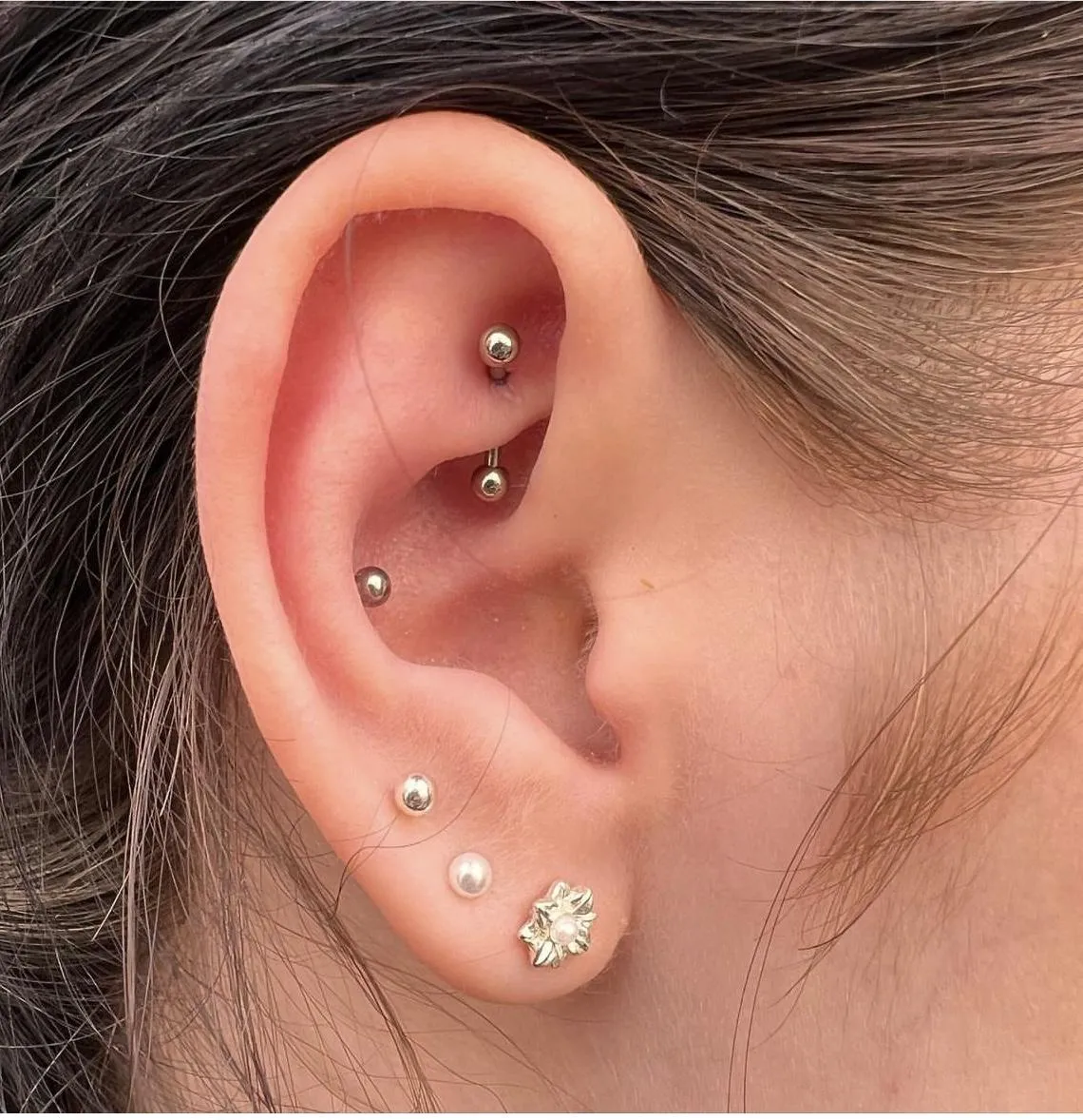 Flat and Conch Piercing