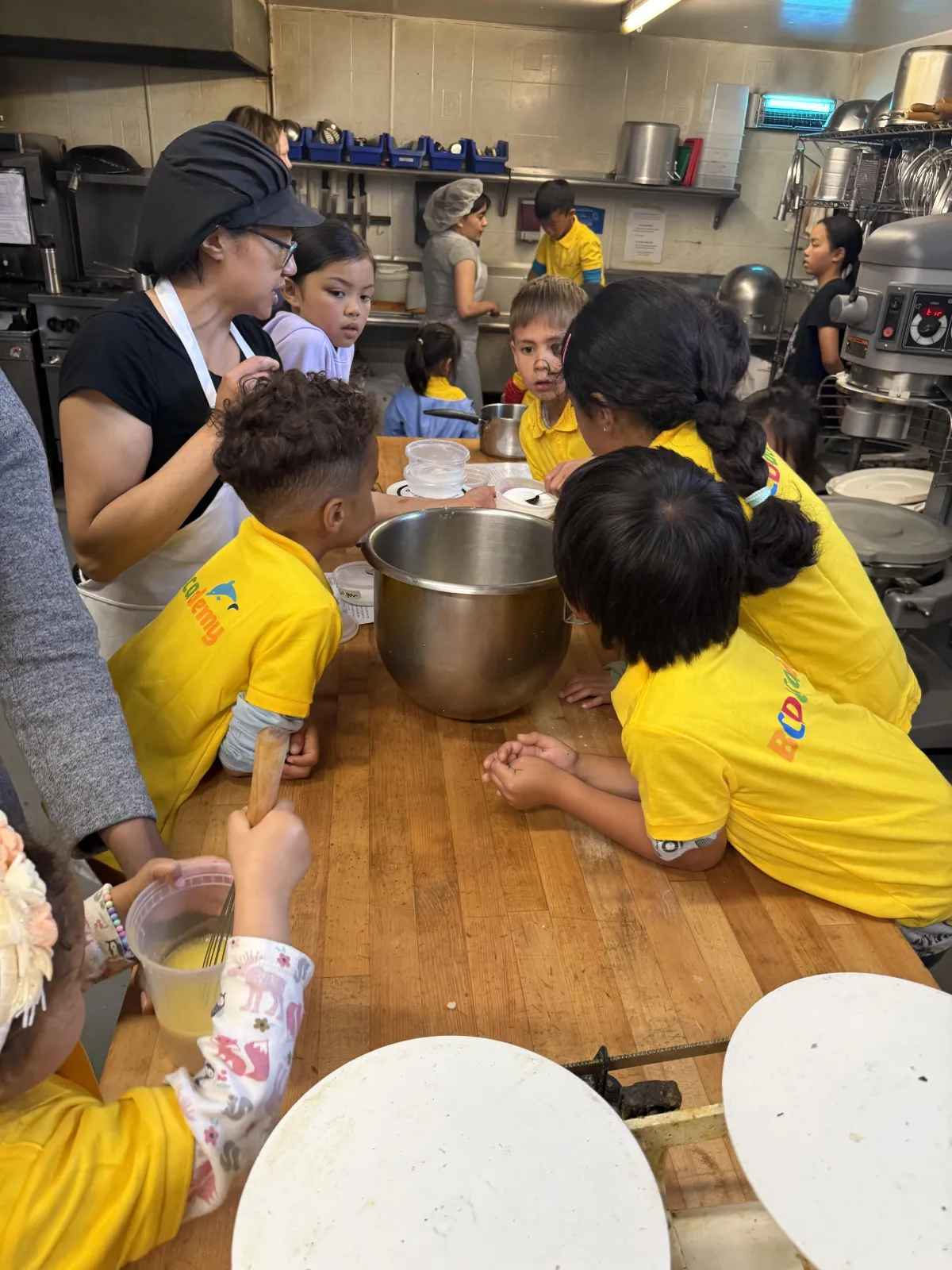 a close up of a camera and a cup