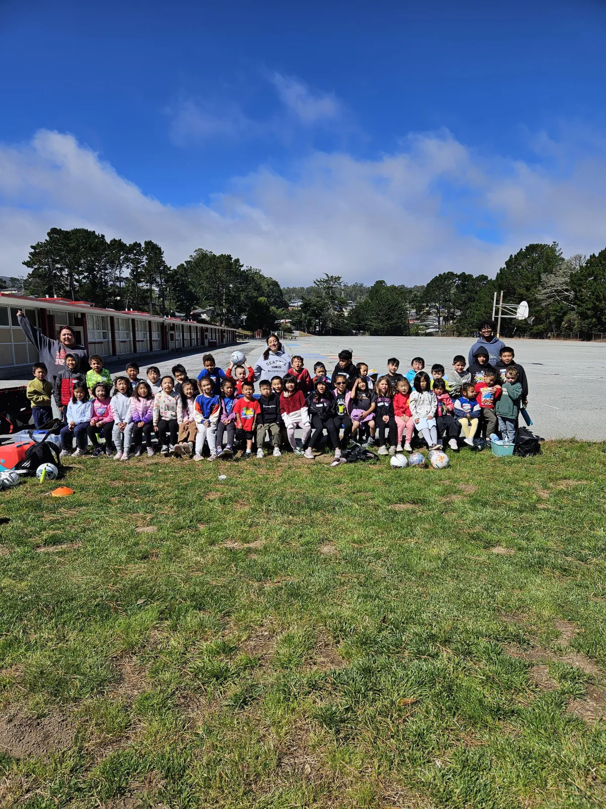 woman placing sticky notes on wall