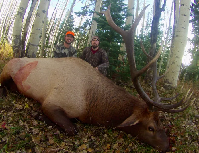 Group of hunters preparing gear