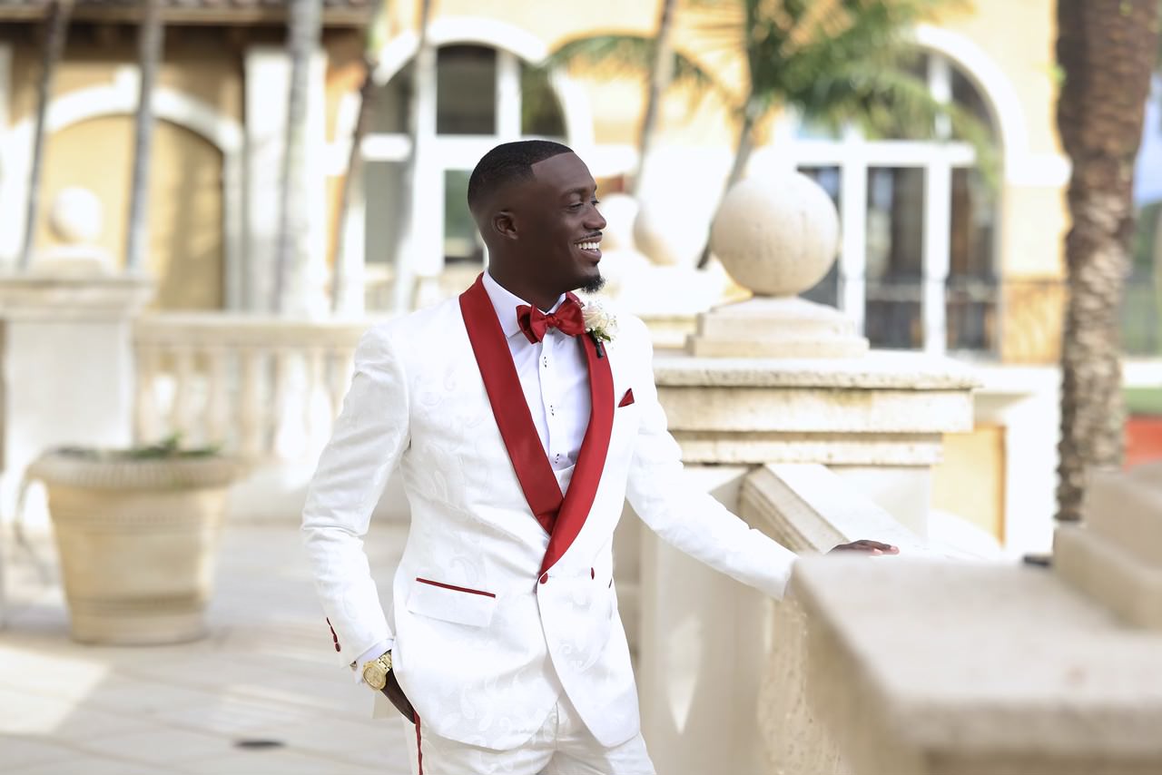 man wearing black suit jacket