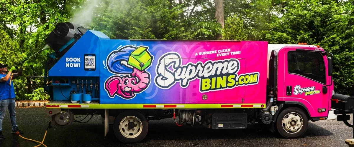 Supreme Bins cleaning truck providing eco-friendly trash bin cleaning service.