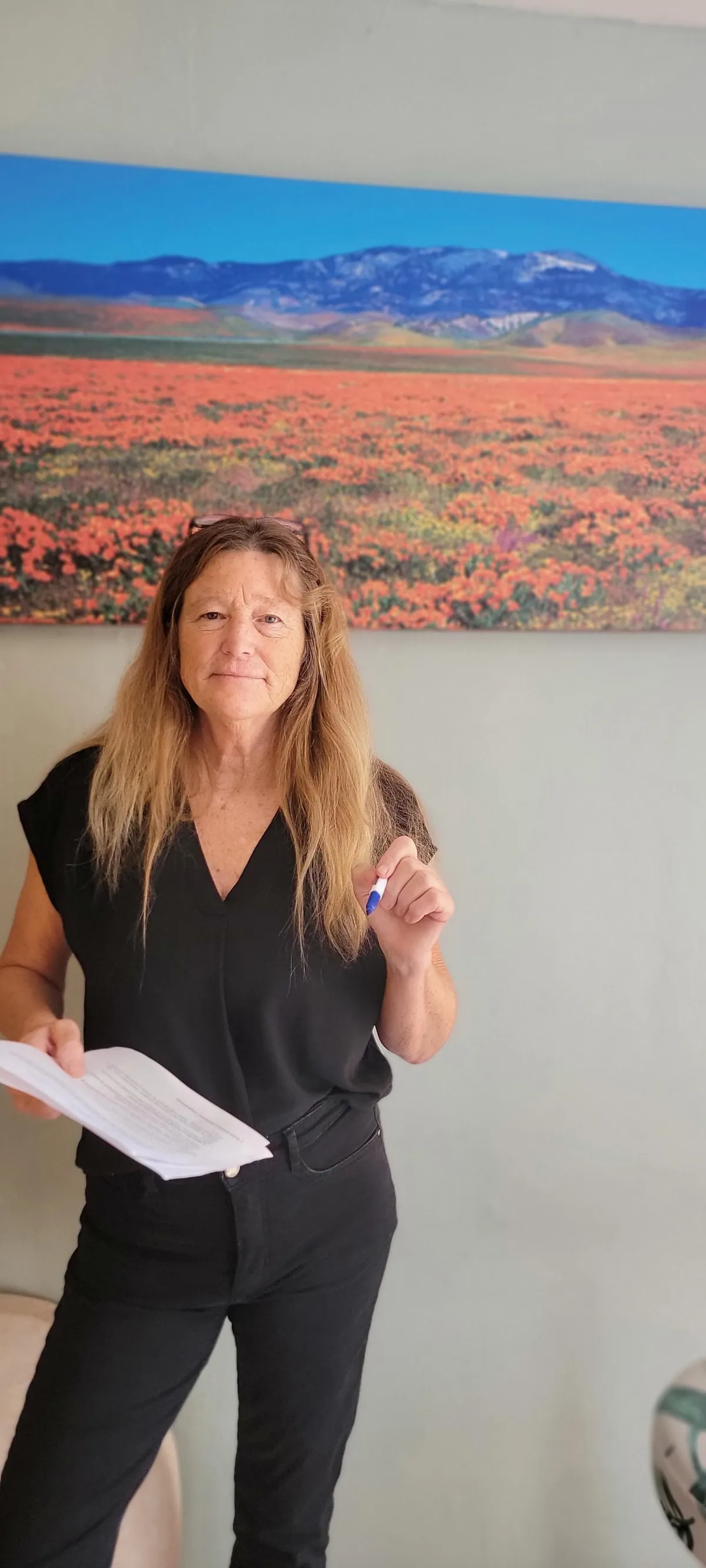 a branch of a tree with pink flowers