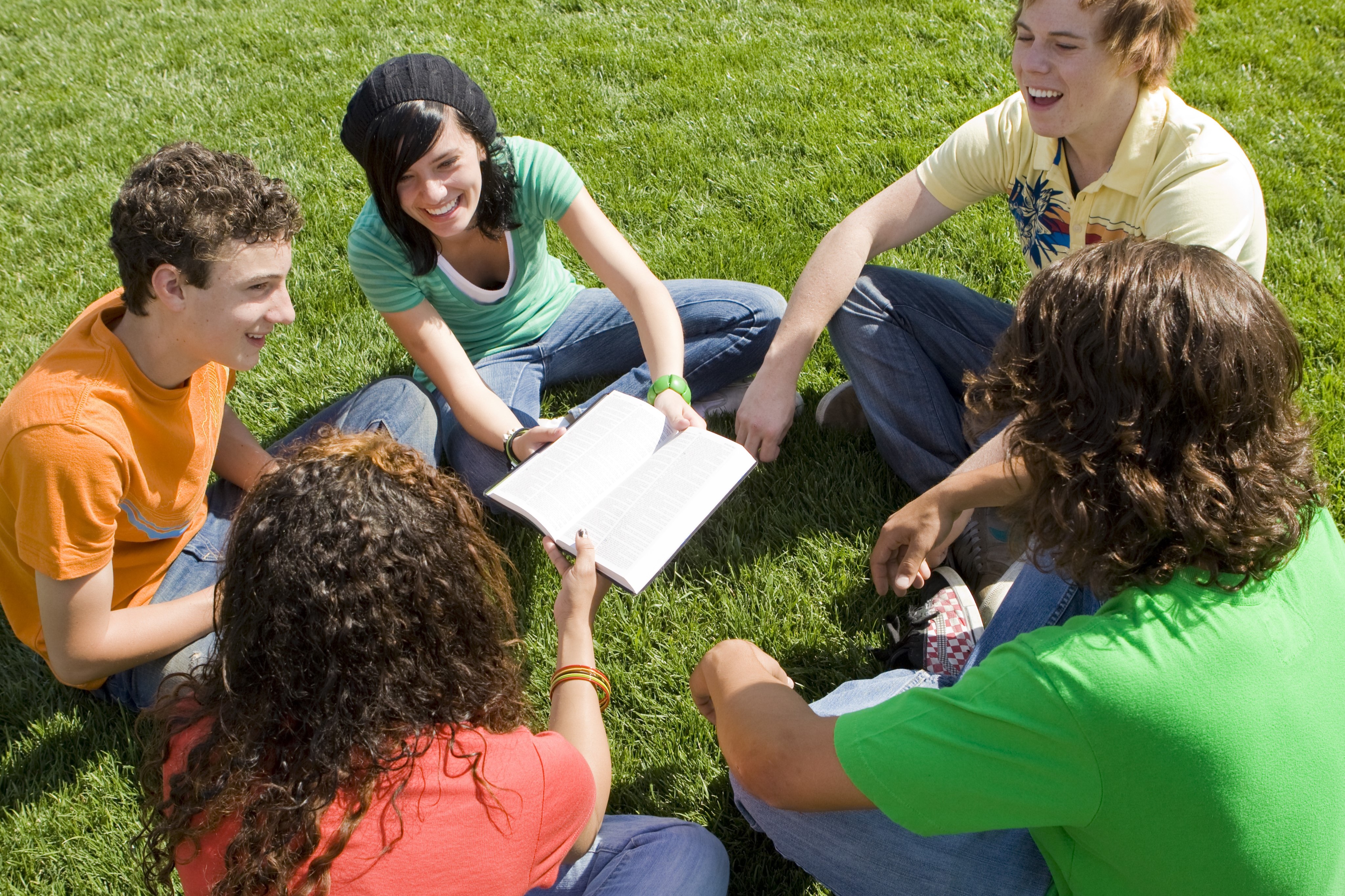 Youth group teenagers engaging in a Bible study