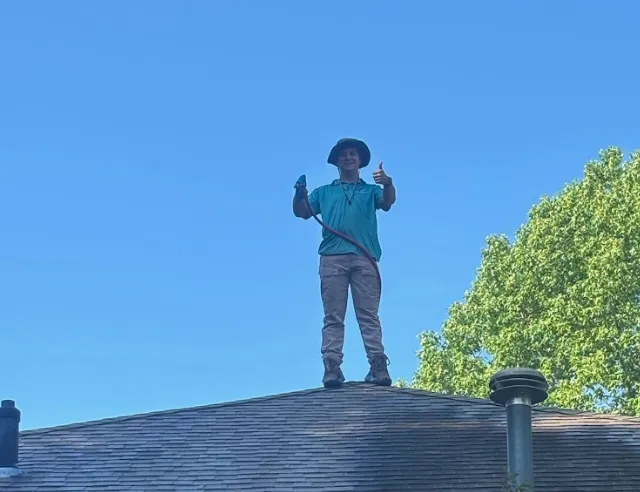 nolan mccrory owner of shiphape exteriors completing a roof wash in tallahassee fl